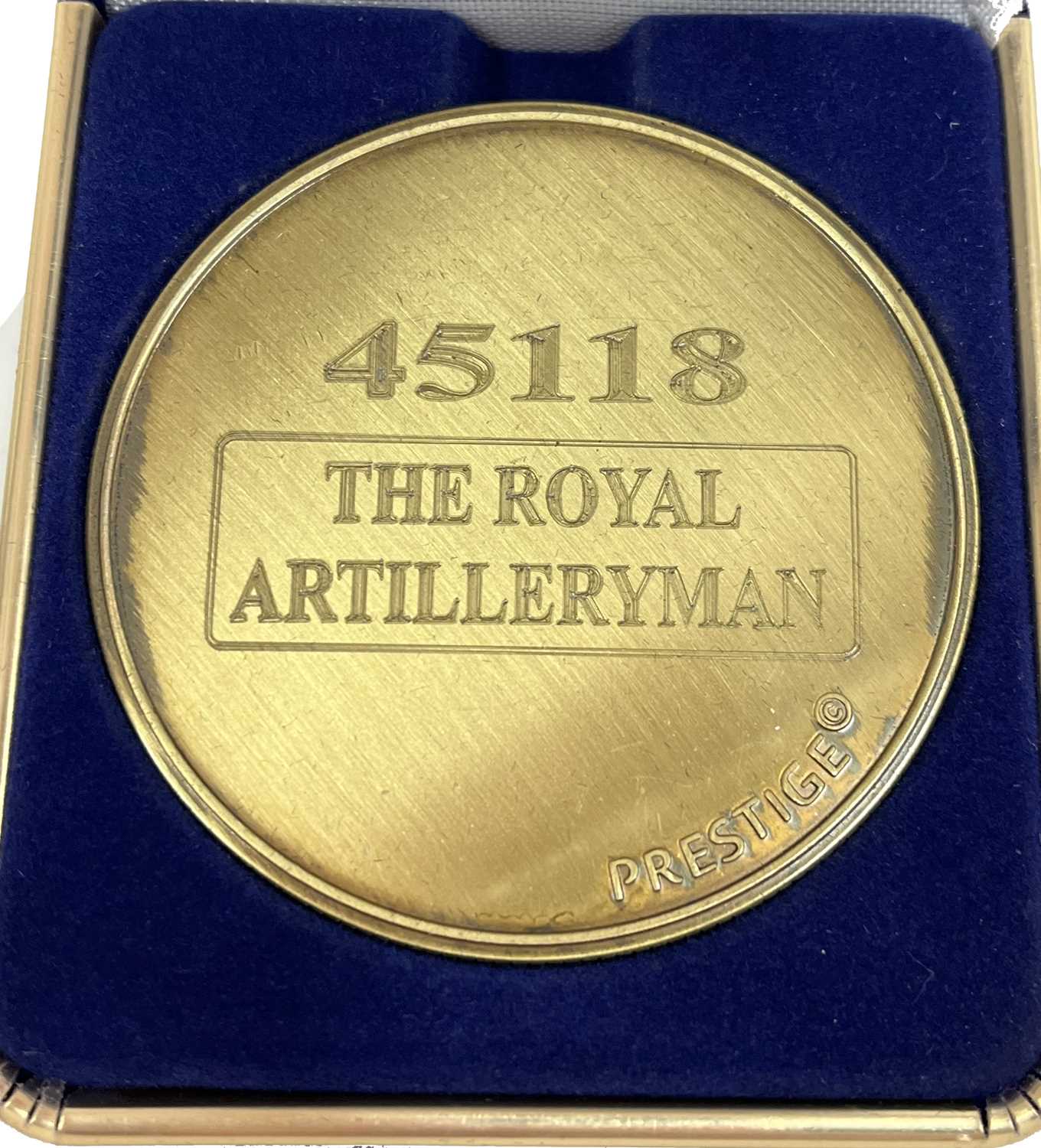 A commemorative gold award medallion to 45118 The Royal Artillery