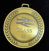 A commemorative gold award medal to 667799 Evening Star GBRF
