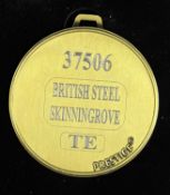 A commemorative gold award medal to Skinningrove 37506 British Steel Skinningrove TE