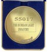 A commemorative gold award medallion to 55017 The Durham Light Infantry