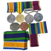 First World War and Interwar British medal group of four medals to include George V 1914-1918 War