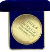 A commemorative gold award medallion to 55014 The Duke of Wellington Regiment