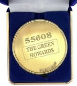 A commemorative gold award medallion to 55008 The Green Howards