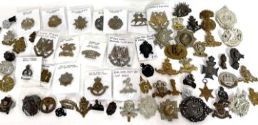 Large Quantity of Victorian and 20th Century military cap badges bearing regiments and dates and