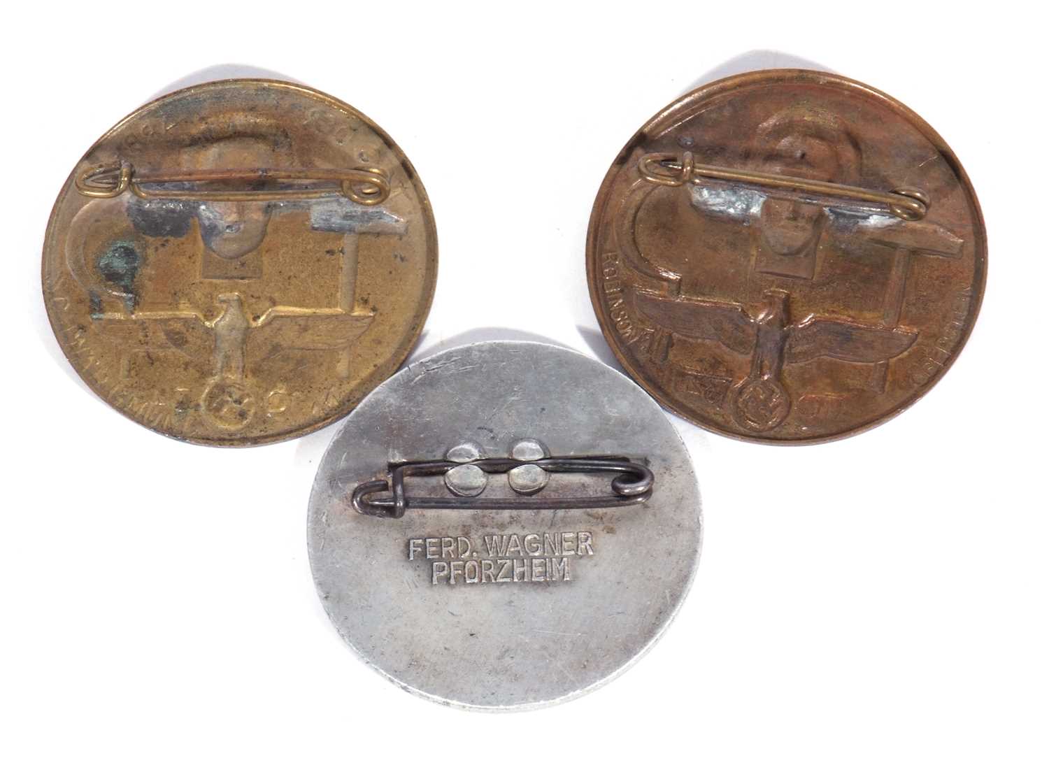 Three Third Reich International Labour Day badges, including 1st May 1936 marked F Wagner - Image 2 of 2