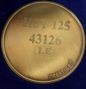 A commemorative gold award medallion to HST 43126 LE