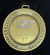 A commemorative gold award medal to 37505 British Steel Wokington TE