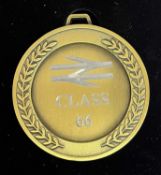 A commemorative gold award medal to 66701 Whitemoor GBRT