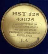 A commemorative gold award medallion to HST 43025 the Institution of Railway Operations 2000-2010,