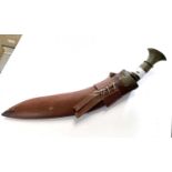 Kukri knife with horn handle and metal pommel, double fuller to blade together with leather scabbard