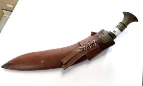 Kukri knife with horn handle and metal pommel, double fuller to blade together with leather scabbard