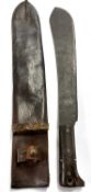 1940 dated America machete in 1940 dated leather scabbard (a/f), length approx 50cm