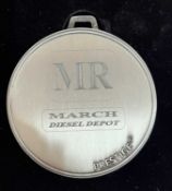 A commemorative silver award medal to March Diesel Depot