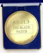 A commemorative gold award medallion to 55013 The Black Watch