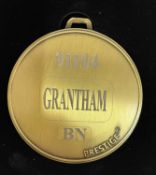 A commemorative gold award medal to 91104 Grantham BN