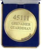 A commemorative gold award medallion to 45111 Grenadier Guardsman