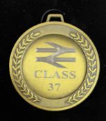A commemorative gold award medal to 37503 British Steel Shelton TE