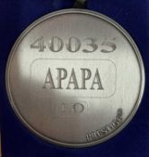 A commemorative silver award medallion to 40035 APAPA LO
