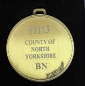 A commemorative gold award medal to 91113 County of North Yorkshire BN