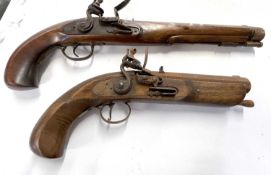 A Flintlock pistol marked 1974 and one other