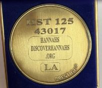 A commemorative gold award medallion to HST 125 43017 hannah's Discoverhannahs.org LA