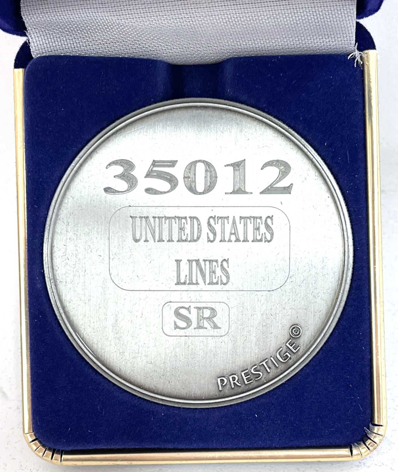A commemorative silver award medallion to 35012 United States Lines SR