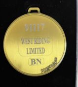 A commemorative gold award medal to 9117 West Riding Ltd BN