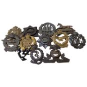 Quantity of 12 British and Commonwealth WWI/WWII cap badges to include Royal Flying Corps, V