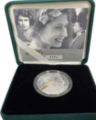 A 2006 UK Silver Piedfort five pounds proof coin to commemorate Her Majesty Queen Elizabeth II
