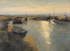 John Tuck (British, 20th century), An estuary view with moored boats (one numbered LN181), oil on