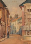 Charles Mayes Wigg (British,1889-1969), "A street in Cromer, Norfolk", watercolour, signed and dated