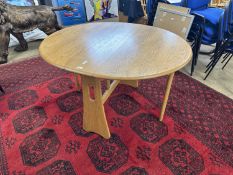 Narrow Ercol drop leaf light elm dining table, 107cm wide