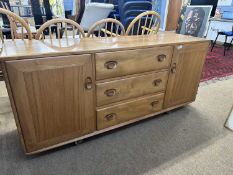 Ercol light elm sideboard with two doors and three drawers, 156cm wide