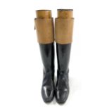 Pair of light brown leather tot hunting right boots with wooden trees