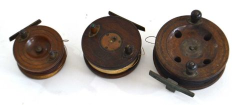 Three various wooden fishing reels