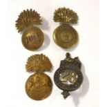 Quantity of four Victorian Glengarry and Shako cap badges to include 104th Infantry of Foot,