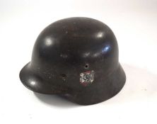 Second World War Third Reich SS Double Decal M42 Stahlhelm helmet together with original leather