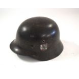 Second World War Third Reich SS Double Decal M42 Stahlhelm helmet together with original leather