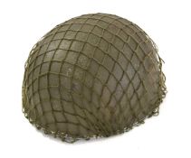 20th Century British MkII Paratroopers helmet with chin strap, liner dated 1955 together with helmet