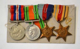 Group of four British Second World War Campaign Medals to include 1939-45 Star, Africa Star, 1939/45