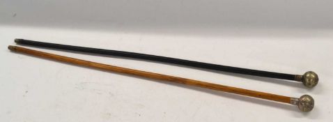 Two RAF silver plated round ball topped swagger sticks, circa 1918-23, both measuring approx 70cm