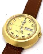A Cronel gents wristwatch, the watch has a gold coloured dial with day date aperture and a