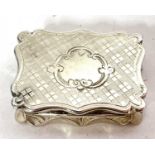 A Victorian silver vinaigrette of typical form with wavy edges, engine-turned decoration around a