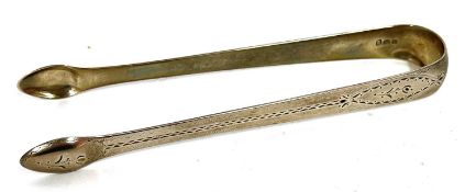 Pair of George III silver sugar tongs with chased and engraved decoration, hallmarked for London