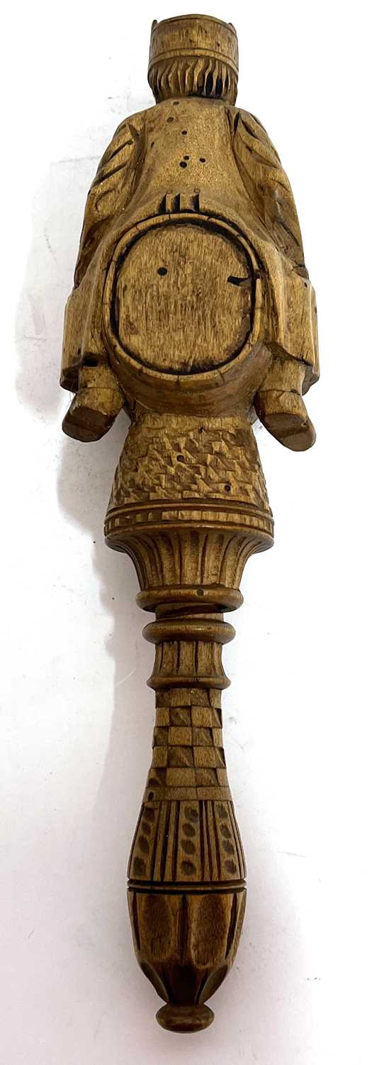 An antique treen box wood nut cracker, a carved figure sitting astride a barrel with screw handle, - Image 4 of 8