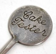 A hallmarked silver "Cake Tester", Birmingham 1968, makers mark is for W.M Ltd, 20cm long