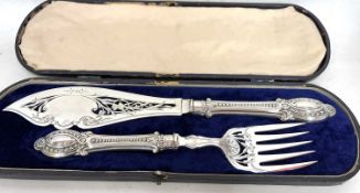 A pair of Victorian silver plated servers, the ferrules with a Victorian registration mark, in