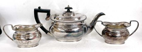 Hallmarked silver three piece tea service comprising teapot, sugar bowl and cream jug, Sheffield