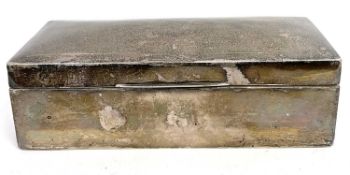 A hallmarked silver table cigarette box of rectangular form, the slightly domed hinged lid