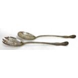 Pair of Edwardian silver salad servers, the bowls engraved and chased with foliate design,